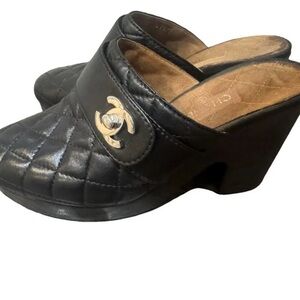 Chanel Black Quilted Mules with Silver Logo